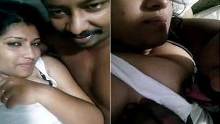 Tamil wife gives oral pleasure to her husband's breasts
