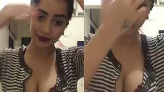 Horny cat shows off her big breasts and talks to fans
