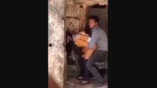 A hot couple from Orissa enjoys doggy and standing sex in an abandoned building
