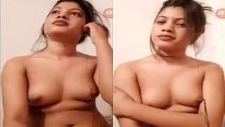 Bangla beauty flaunts her breasts in a seductive video