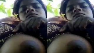 Rural Indian woman flaunts her breasts in a video