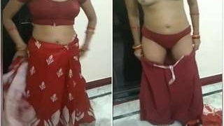 Sensational desi bhabhi strips down to show her bare breasts