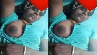Older aunt flaunts her large breasts in a video call