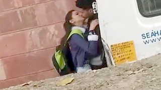 College-aged desi couples indulge in passionate kissing