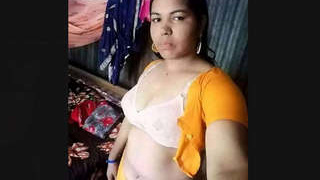 Mature aunty in part wearing cloths