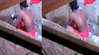 Stealthy recording of Indian woman washing her body in public