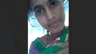 Watch a Nepali girl flaunt her big boobs and pussy in this video