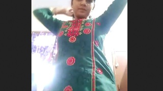 Bhabhi in a suit gets wild in a porn video