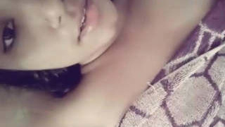 Cute Indian teen girl pleasures herself with her fingers