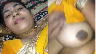 Randy Bhabha's seductive pose with her ample bosom