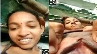 Indian village girl reveals her breasts and pleasures herself on camera