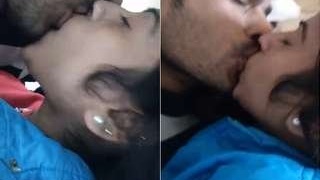 Desi couple shares a passionate kiss in bed