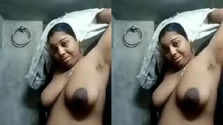 Indian wife flaunts her breasts for her husband in a video