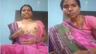 Busty Telugu bhabhi stripping and pleasuring herself on camera