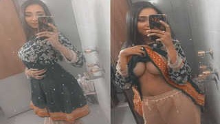 Watch a Pakistani girl show off her big breasts in this steamy video