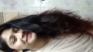 Nude Indian girl takes solo shower in bathroom