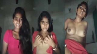 Attractive young Indian wife shows off her bare body in her home