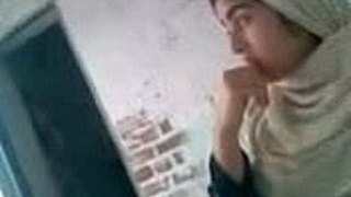 Pakistani woman in grey hijab gets fucked and talks dirty in Lahore
