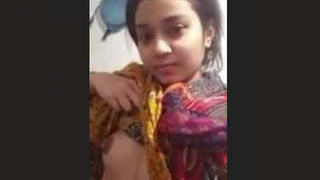 Hot Indian girl flaunts her breasts and pussy in a steamy video