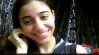 Shy girl's secret pleasure: Watch her rub her pussy on camera