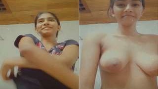 Exclusive video of a cute girl flaunting her big boobs in part 2