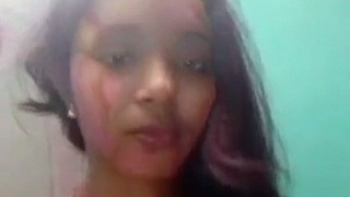 Watch a Desi girl get naked after Holi festival in this sexy video
