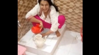 Desi aunty masturbating and peeing