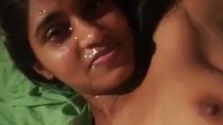 Nude Indian girl gets her face covered in cum