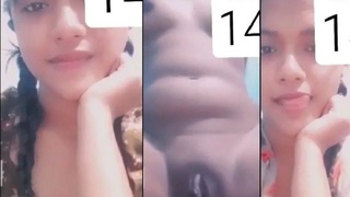 A young attractive girl reveals her intimate parts to her boyfriend in front of her asleep sister
