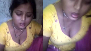 Lovely girl enjoys milky chapathi with a show of her cleavage