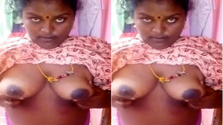 Indian wife flaunts her breasts in explicit video