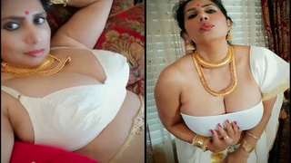 Indian auntie with big tits gets naughty