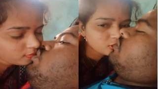 Desi couple shares a passionate kiss in bed