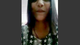 Assamese girl flaunts her breasts in a video