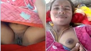 Bhabhi bathes and shows off her big boobs and pussy