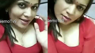 Busty boudi flaunts her assets in a revealing outfit