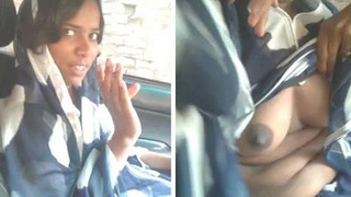 Desi babe with big tits gives a blowjob in the car