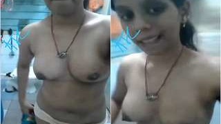 Exclusive video of cute Indian girl showing off her boobs and pussy