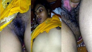 Watch a shy Indian girl get naked and show off her hairy pussy