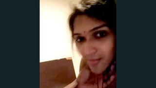 Indian babe gives a blowjob to a customer in a hotel room