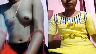 Exclusive video of a cute Indian girl stripping and baring her breasts
