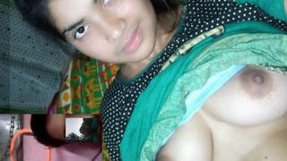 A young and beautiful Indian girl bares it all on camera