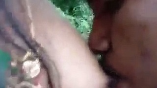 Outdoor sex video of woman sucking boobs in public