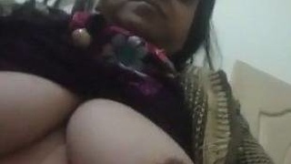 Unveiling a Pakistani woman's pants and revealing her big boobs