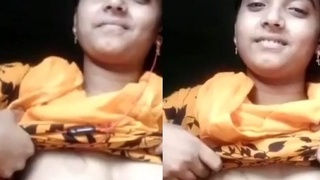 Bangladeshi girl with a cute smile shows off her body in a village