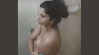 Desi girl's bathing ritual captured in a new video by her stepbrother