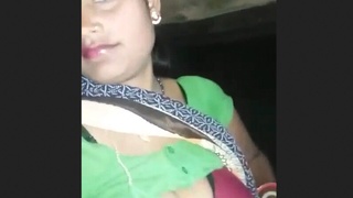 A village bhabhi records a video for her lover, revealing her breasts and genitals