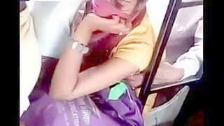 Busty Indian babe gets her boobs fondled on a crowded bus