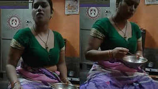 Elderly woman in saree flaunts her breasts