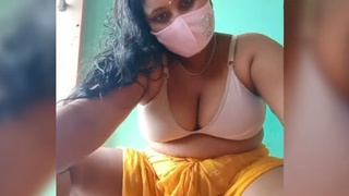 Sexy bhabi with huge breasts gets naughty on camera